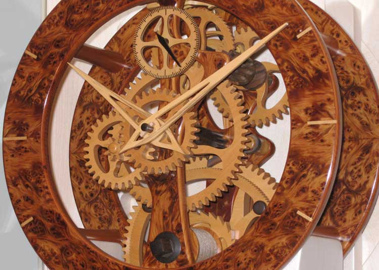  Eight day skeleton clock in burr yew